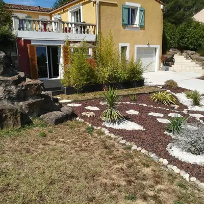 a garden in front of a house at grand studio des rivages cathares in Carcassonne