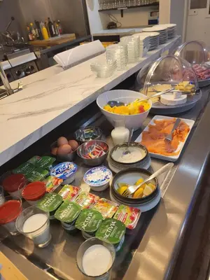 a buffet line with many different types of food at Brit Hotel Plaisance A9/A61 in Narbonne