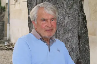 a man standing in front of a tree at La Lauze in Vielmur-sur-Agout