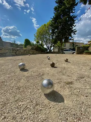 a group of balls sitting on the ground at Logis Hôtel Château De Palaja in Carcassonne