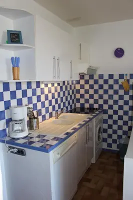 a kitchen with a sink and a counter top at Gites de France Bleu à la mer in Port-la-Nouvelle