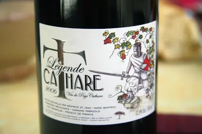 a bottle of red wine with a label on it at Hotel Axat in Axat