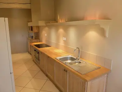 a kitchen with a sink and a counter at Holiday Home in Loupia with Private Pool in Loupia