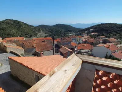 a view of a town with red roofs at Chez Pierre in Bélesta