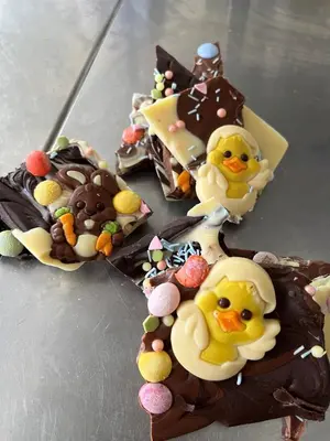 a group of chocolate treats with rubber ducks on them at Chateau de Blomac in Blomac