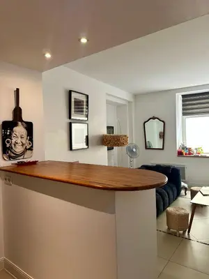 a kitchen with a sink and a counter top at ART'APPART in Narbonne