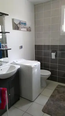 a bathroom with a sink and a toilet at Gite Pourquoi Pas in Montégut-Lauragais