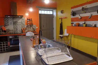 a kitchen with a counter with a dish basket on it at La Bonne Planque - Maison éclusière de la Domergue Canal du Midi in Mas-Saintes-Puelles