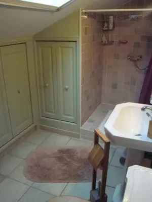 a bathroom with a sink and a toilet and a shower at l'Oulibo in Villeneuve-les-Corbières