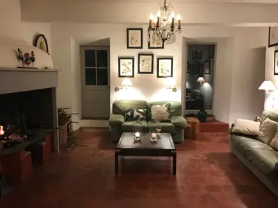 a living room with a couch and a coffee table at Maison vigneronne in Montlaur