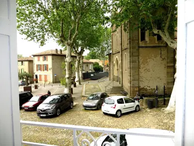 a group of cars parked in a parking lot at cote de la cite medievale in Carcassonne