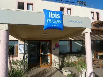a sign on the front of a building at ibis budget Narbonne Sud A9/A61 in Narbonne