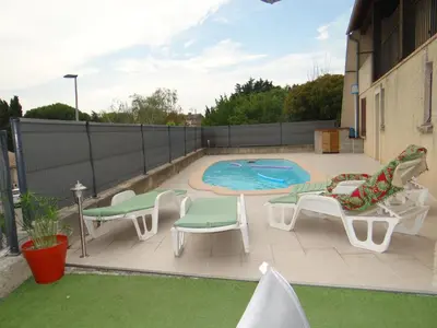a patio with chairs and a swimming pool at 37 au soleil in Montréal