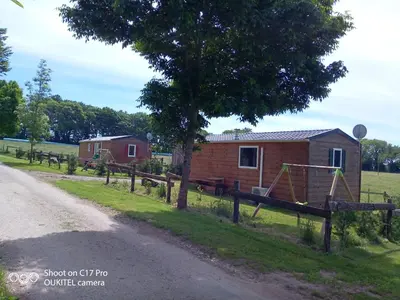 a tiny house on the side of a road at Les chalets de Bes 