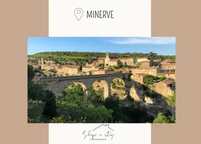 a picture of a town with a stone bridge at Apartment Jeanne in Carcassonne