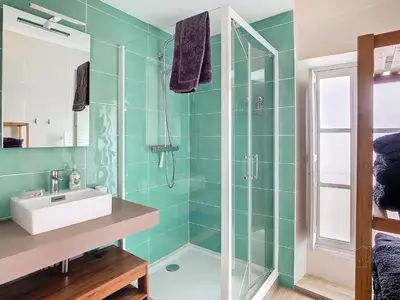 a bathroom with a sink and a shower at Apartment Carcasses in Carcassonne