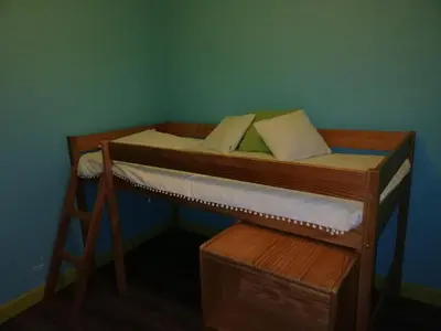 a bunk bed with two pillows on top of it at Canta aoussel in Moussoulens