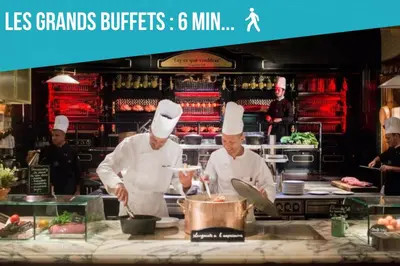 a group of chefs preparing food in a kitchen at La Maisonnette Narbonnaise (Proche Grands Buffets) in Narbonne