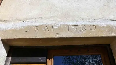 a sign over the door of a building with the words jam tree at Belrepayre in Manses