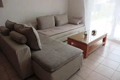 a living room with a couch and a coffee table at Escapade Audoise in Sallèles-dʼAude