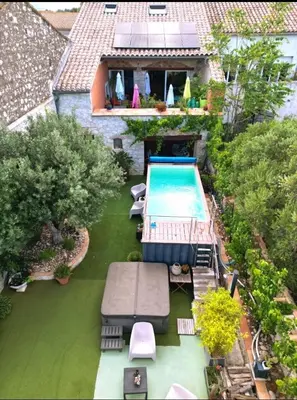 an aerial view of a backyard with a swimming pool at VILLA ARTEMIA Maison vigneronne - chambre d hôtes-B&B-piscine et spa in Sigean