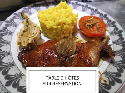 a plate of food with chicken and vegetables and rice at VILLA ARTEMIA Maison vigneronne - chambre d hôtes-B&B-piscine et spa in Sigean