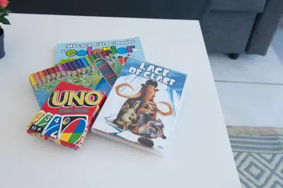two childrens books sitting on top of a table at La Belle Gruissanaise in Gruissan