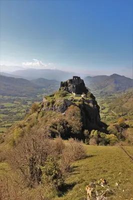 a castle on top of a hill in a field at Toupinat in Montferrier