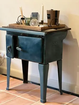 an old desk with a wooden top on top at Maison Marie in Lagarde