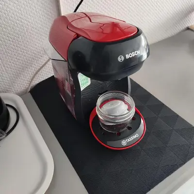 a black and red mixer sitting on a counter at Maison près de la plage in Port-la-Nouvelle