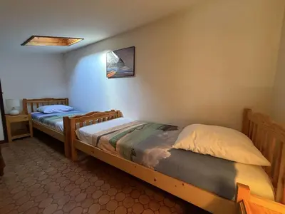 a bedroom with two beds in a room at Villa T2 Mezzanine 4 pers avec Parking à La Franqui - FR-1-81-370 in La Franqui-Plage