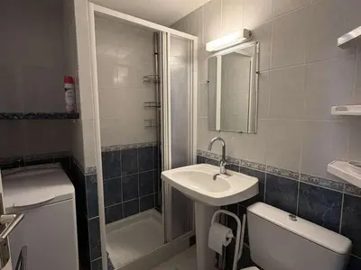 a bathroom with a sink and a shower and a toilet at Villa T2 Mezzanine 4 pers avec Parking à La Franqui - FR-1-81-370 in La Franqui-Plage