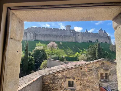 a view of a castle from a window at Pelletier du Claux in Carcassonne