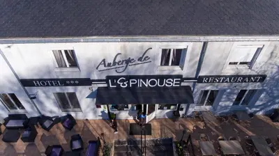 an overhead view of a building with a sign for a hotel at Logis hôtel restaurant Auberge de l'Espinouse in Fraisse-sur-Agout