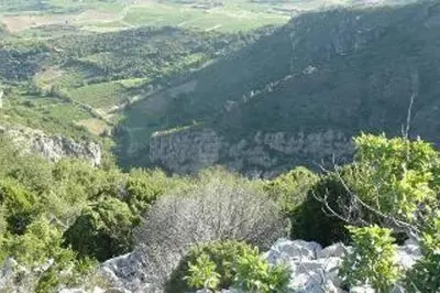 a view of a valley from the top of a mountain at Maison de la Fontaine in Embres-et-Castelmaure