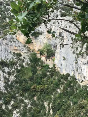 a village on the side of a mountain at Maison de la Fontaine in Embres-et-Castelmaure
