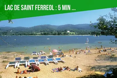 a beach with a bunch of people on it at TERRASSE du GET in Revel