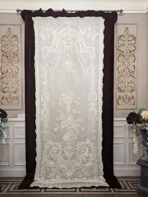 a curtain is hanging on a wall in a room at Chateau de Thuries in Revel
