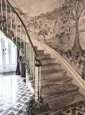 a stairway with a mural of auliculiculiculiculiculiculiculic at Chateau de Thuries in Revel