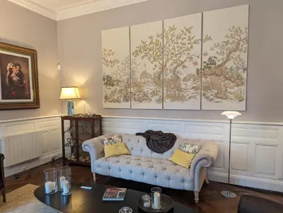 a living room with a couch and a table at Chateau de Thuries in Revel