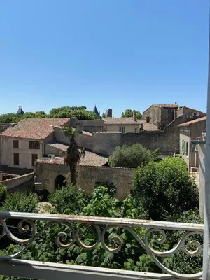 a view of a city from a balcony at Appartements Pech Mary in Carcassonne