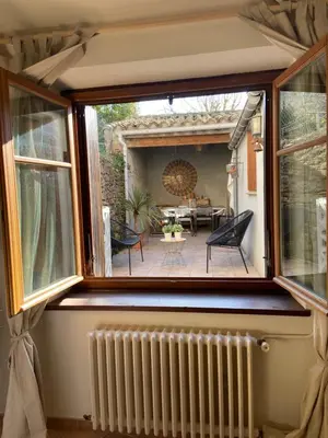 a view from a window of a patio with a radiator at Côte de la Cité in Carcassonne
