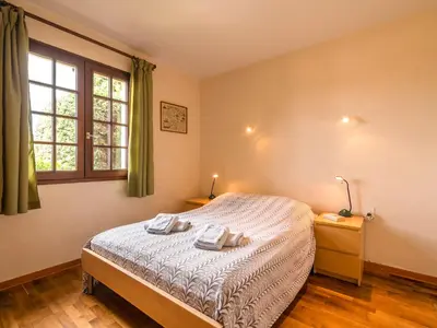 a bedroom with a bed and a window at Villa in Beaufort with Pool & Views in Beaufort