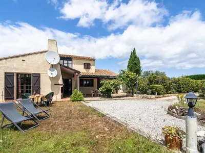 a villa with a patio and a house at Villa in Beaufort with Pool & Views in Beaufort