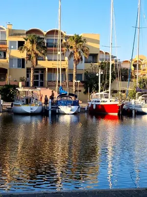 a group of boats are docked in a marina at Gruissan Village APPT Duplex 51m2 in Gruissan