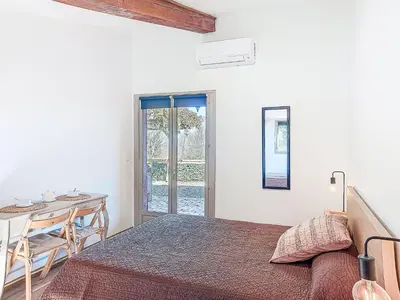 a building with a tower on top of it at Holiday Home Les Ecuries by Interhome in Alet-les-Bains