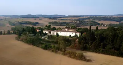 an aerial view of a house in the middle of a field at La Ginelle - Appartement Guy in Airoux