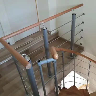 a set of stairs in a building at L'Amandier in Maury