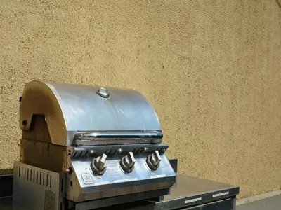 a grill with four burners on top of it at Spacious Villa Retreat in Carcassonne in Carcassonne