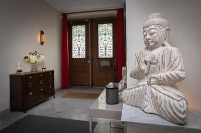 a statue of a woman sitting on a table in a room at 45BB in Carcassonne